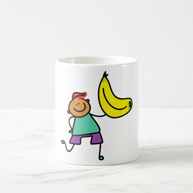 Caneca De Café Criança Jogada Segurando Banana Amarela Grande (Criador carregado)