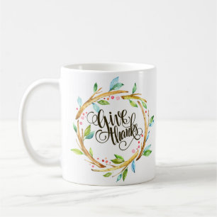 Caneca De Café Dando a obrigados a tipografia com a grinalda de