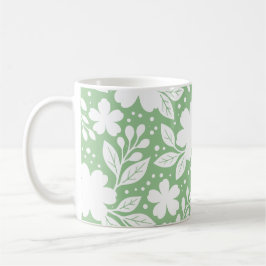 Caneca De Café Desenho Floral Branco em um Fundo Verde Suave