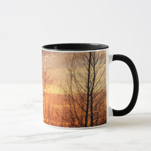 caneca de café do por do sol do inverno
