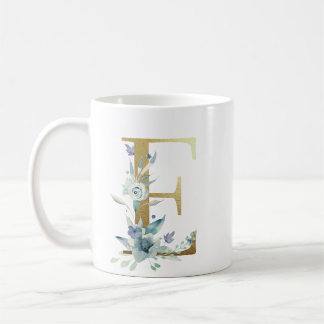 Caneca De Café E ouro inicial com folhagem floral azul (Esquerda)