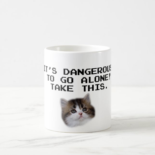 Caneca De Café É perigoso ir sozinho toma este gatinho (Centro)