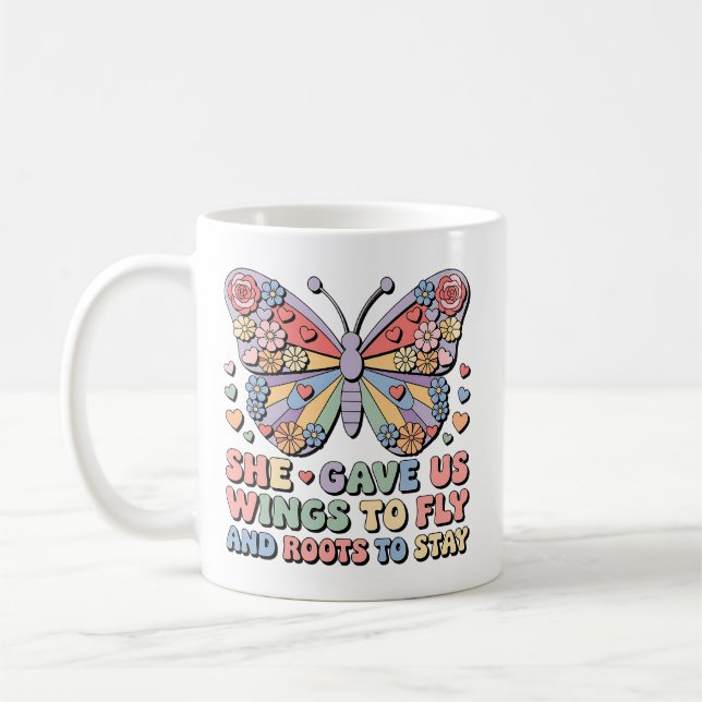 Caneca De Café Ela Nos Deu Asas Para Voar E Raízes Para Ficar Man (Esquerda)
