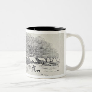 Caneca De Café Em Dois Tons Aproximando uma vila no inverno