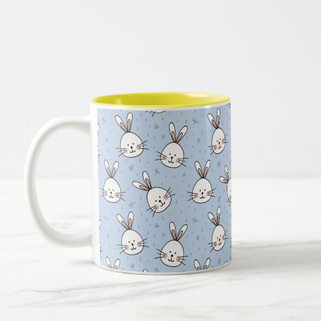 Caneca De Café Em Dois Tons Coelhos de Páscoa Brancos em Azul Claro (Esquerda)