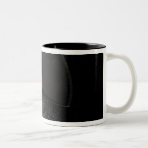 Caneca De Café Em Dois Tons Conceito do artista mostrando um possível núcleo i