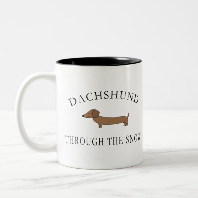Caneca De Café Em Dois Tons Dachshund Através Da Neve (Esquerda)
