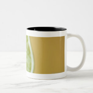 Caneca De Café Em Dois Tons Fim-acima de uma fatia do limão