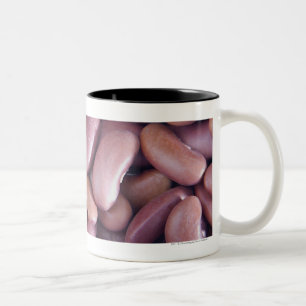 Caneca De Café Em Dois Tons Fim-acima do feijão vermelho