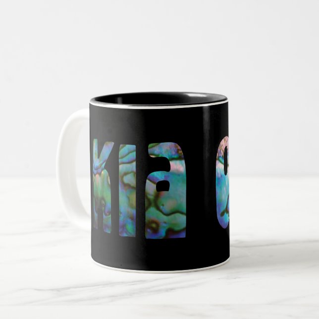 CANECA DE CAFÉ EM DOIS TONS KIA ORA KIWI CRESCENDO PAUA (Frente Esquerda)