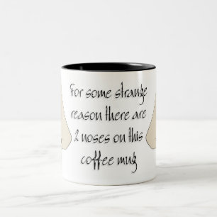 Caneca De Café Em Dois Tons Narizes em uma caneca