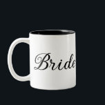 Caneca De Café Em Dois Tons Script Chic "Bride" Preto e Branco<br><div class="desc">Celebre a sua jornada ao "Eu faço" com esta "Bride" Escrita Chic, Black e White Coffee Mug. A elegante escrita negra contrasta lindamente com o exterior branco, criando um olhar sofisticado e moderno. Com seu elegante interior preto, esta caneca traz um toque de estilo chic para seu café ou chá...</div>