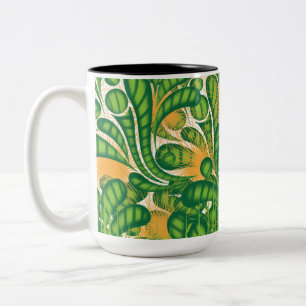 Caneca De Café Em Dois Tons Um padrão artístico verde e dourado representando