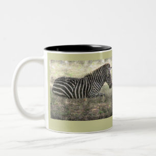 CANECA DE CAFÉ EM DOIS TONS ZEBRA QUE SENTA-SE EM /PHOTOG/ À TERRA DIG.MANIP