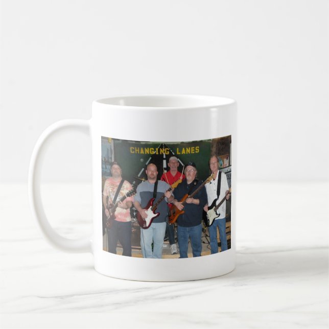 Caneca de café em mudança das pistas (Esquerda)