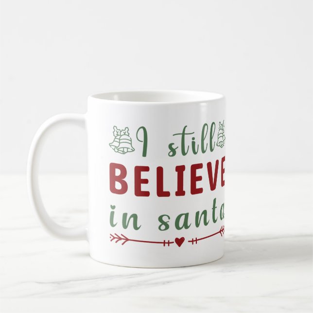 Caneca De Café Eu ainda acredito no Natal das Papais noeis (Esquerda)