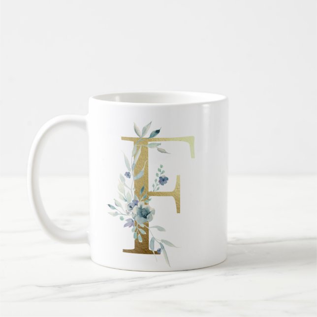 Caneca De Café F ouro inicial com folhagem floral azul (Esquerda)