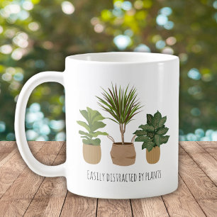Caneca De Café Facilmente Distraído Por Plantas
