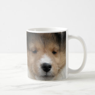 Caneca De Café Feche acima da cara do filhote de cachorro do