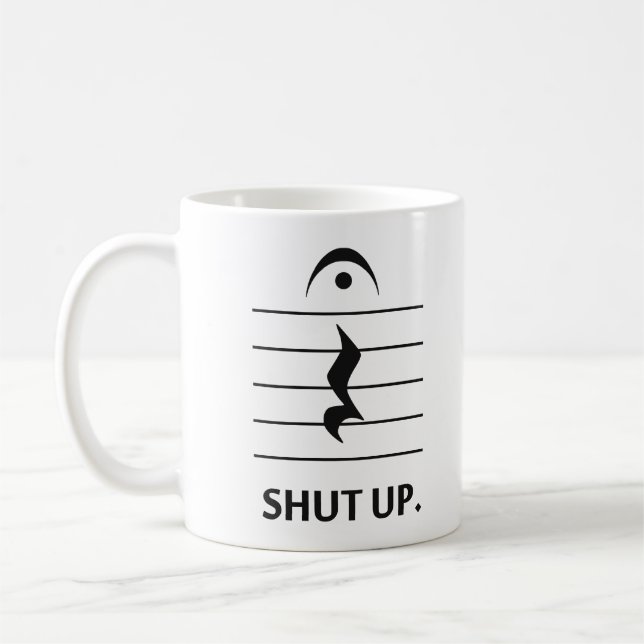 Caneca De Café Feche acima pela notação de música (Esquerda)