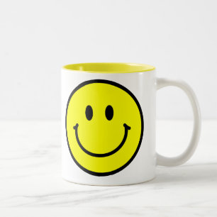 Caneca de café feliz da cara