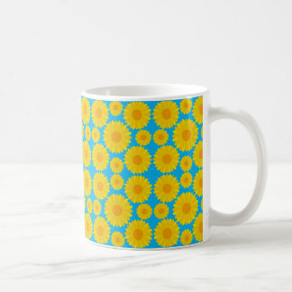 Caneca De Café Flores Amarelas e Laranja Negrito em Fundo Azul