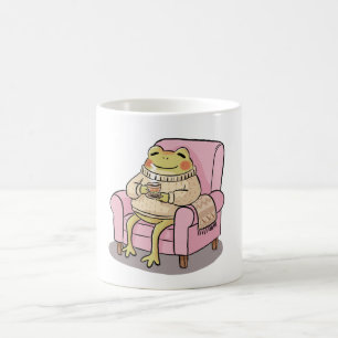 Caneca De Café Ilustração de Sapo Aconchegante Bebendo Chá no Sof