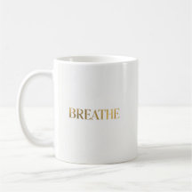 Minimalist typography with gold word breathe