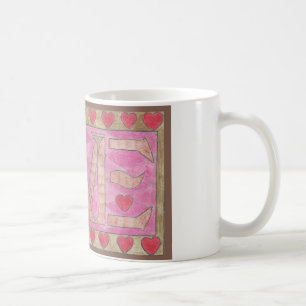 Caneca De Café O amor é uma palavra de quatro letras