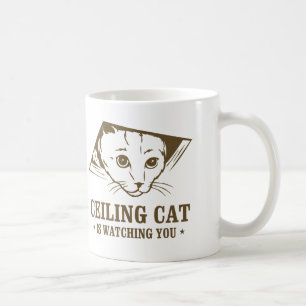 Caneca De Café O gato do teto está olhando-o