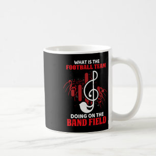 Caneca De Café O que a equipe de futebol está fazendo no campo da