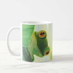 Caneca De Café O sapo verde de olhos grandes atrás da almofada de