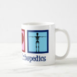 Caneca De Café Ortopedista Peace Love Orthopedics Office<br><div class="desc">Ortopedia de Paz e Amor. Um presente de Natal bonito para um cirurgião ortopédico ou ortopedista que trabalha com o sistema musculosquelético e para os doentes que precisam de cirurgia ao ombro e à anca. Um sinal de paz,  coração,  e um esqueleto.</div>