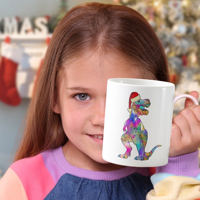 Caneca De Café Papais noeis Engraçados Psicodélicos Tyrannosaurus (Colorful Christmas dinosaur T-Rex wearing a Santa hat pink purple green dino for girls)