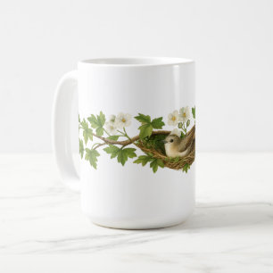 Caneca De Café Pássaro no Ninho de Pássaro em Ramos Floridos