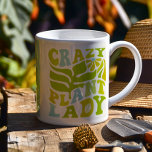 Caneca De Café Personalizar os pavimentões de planta<br><div class="desc">Prepare-se para elevar a sua obsessão com esta vibrante caneca de "Senhora das Plantas Loucas"! Perfeito como presente de um amante de plantas, esta caneca é personalizável, permitindo que você adicione o nome da sua dama favorita de plantas loucas e a faça exclusivamente deles. Quer você beba café matinal ou...</div>