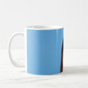 Caneca De Café Pessoa que segura limão