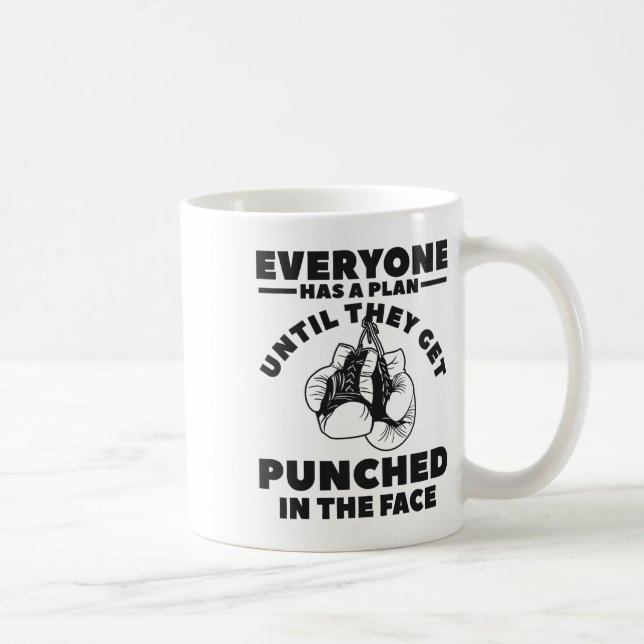 Caneca De Café Todos Têm Um Plano Até Levarem Um Soco No  (Direita)