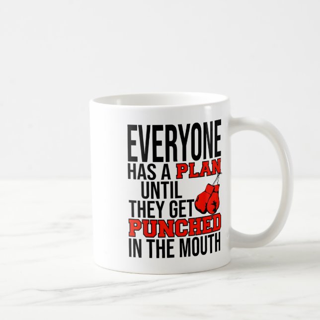 Caneca De Café Todos Têm Um Plano Até Levarem Um Soco No  (Direita)
