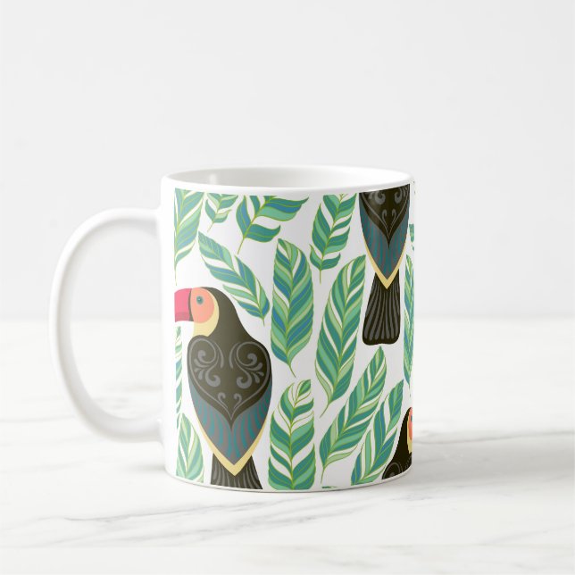 Caneca De Café Tucanos, folhas tropicais, padrão decorativo. (Esquerda)