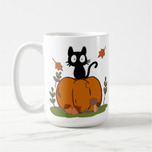 Um gato preto sentado em uma abóbora