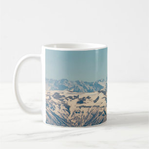 Caneca De Café Uma cordilheira com neve e gelo descongelantes