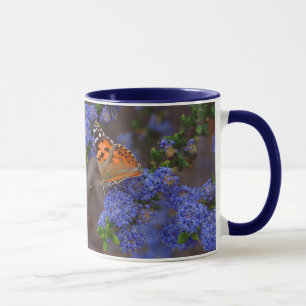 caneca de cerâmica com borboleta
