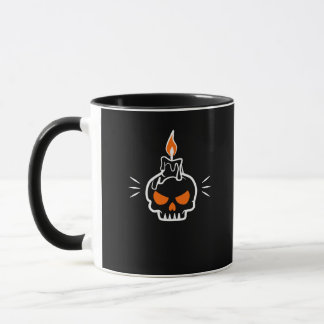 Caneca de crânio com vela