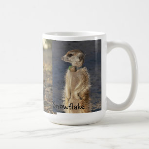 Caneca de Meerkat do floco de neve de Toblerone