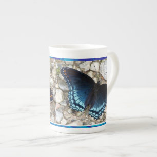 Caneca De Porcelana Cama de Borboleta Azul