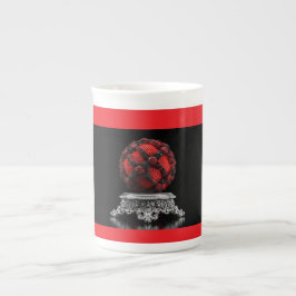 Caneca De Porcelana Esfera Mandelbrot Vermelha e Preta em um Pedestal