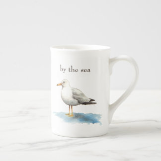 Caneca De Porcelana Gaivota a ser pelo mar