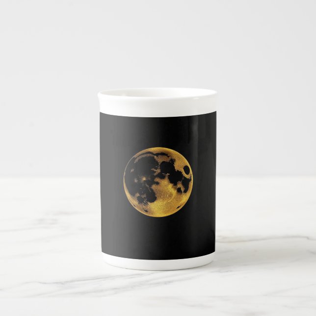 Caneca De Porcelana Lua texturizada dourada sobre preto escuro (Frente)