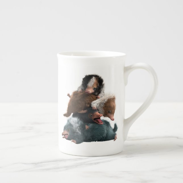 Caneca De Porcelana Pilha Baby NIFFLER™ (Direita)